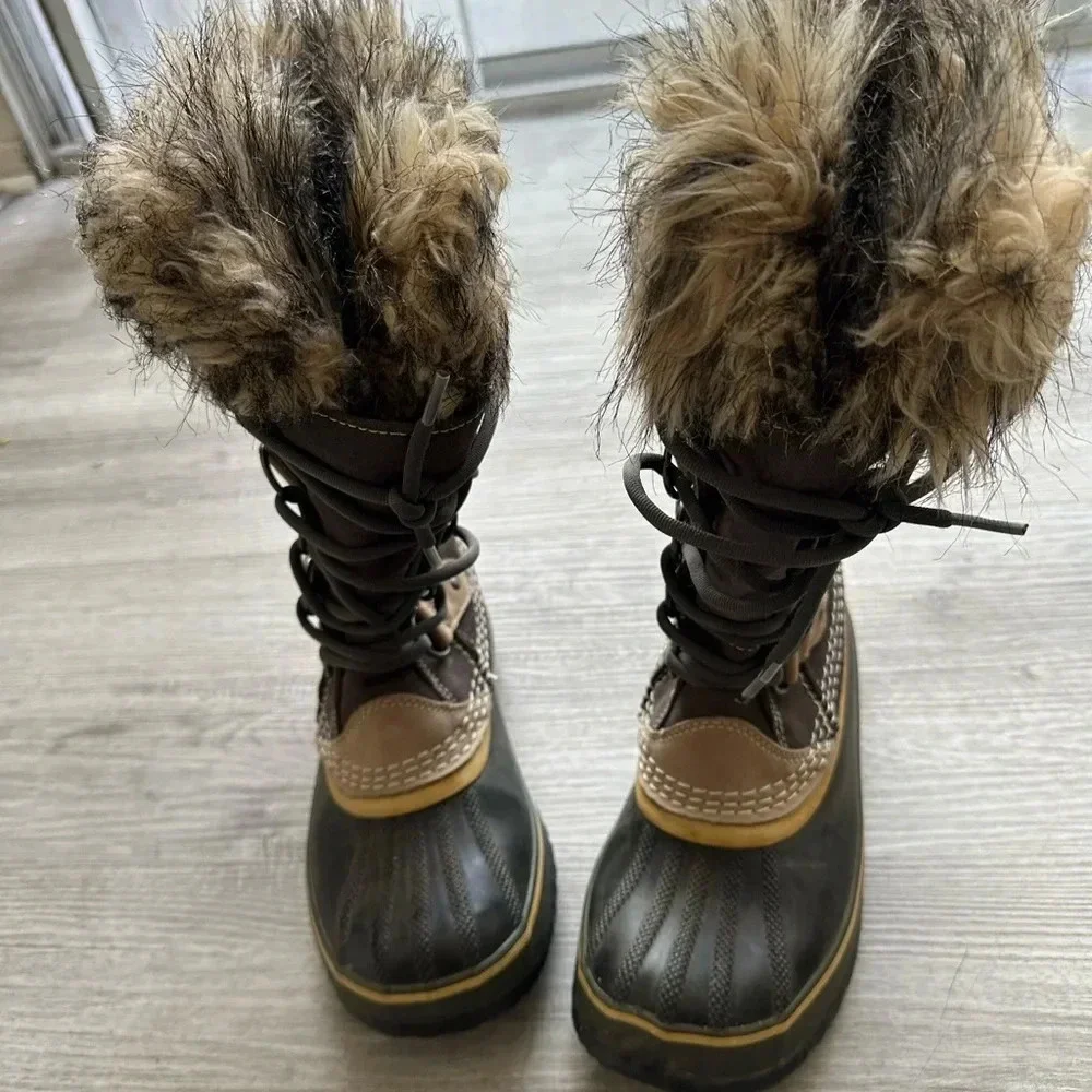 Sorel boots size 7 very roomy waterproof army green suede with faux fur.